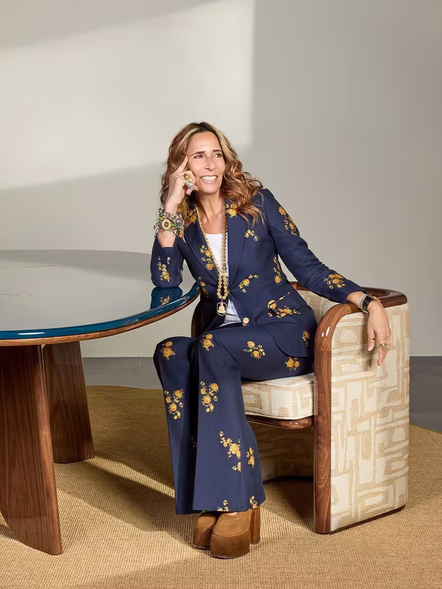 Tara Bernerd seated in a studio
